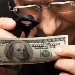 كيفية معرفة الدولار المزور من الأصلي